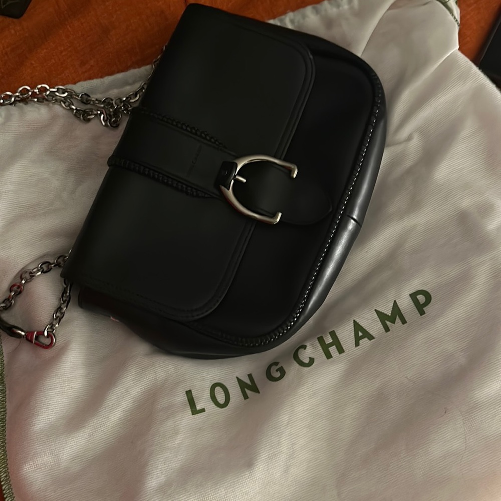 Longchamp made in France . Wore 3 times ! Like new.wear shoulder or crossbody